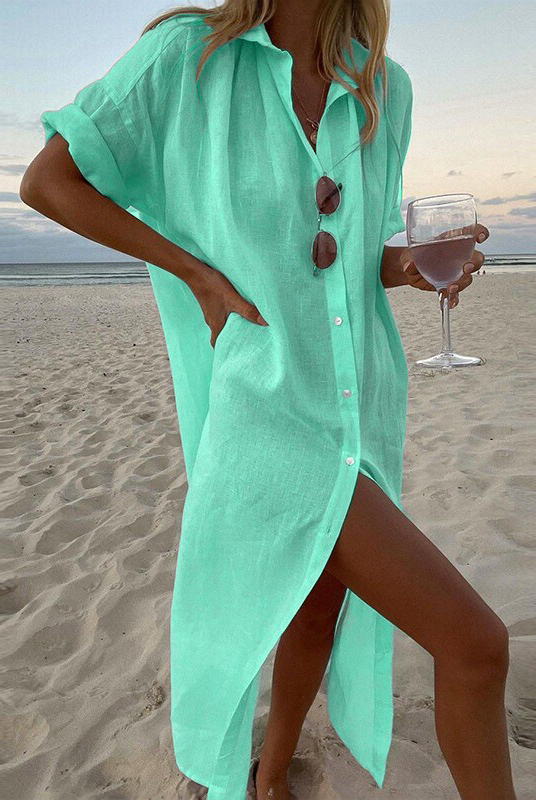Robe en lin vert menthe pour femme, idéale pour les journées d'été. Sa coupe ample et son tissu léger garantissent confort et fraîcheur. Dotée de manches retroussées et de boutons, elle est parfaite pour une tenue décontractée mais élégante à la plage ou lors de promenades estivales.