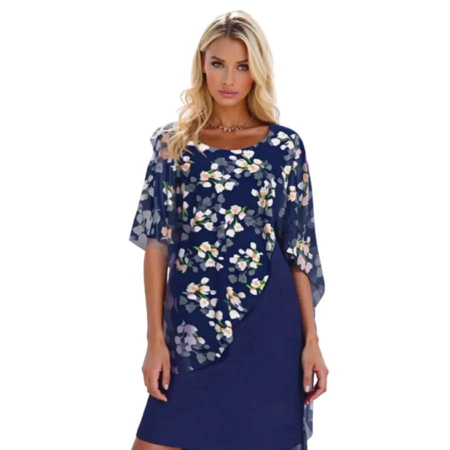 Légère et élégante. Cette robe bleue avec un motif floral délicat est associée à une cape en mousseline fluide, créant un look féminin et raffiné, parfait pour des occasions spéciales ou une soirée élégante."