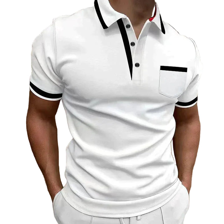 Ce polo blanc pour homme allie élégance et confort. Avec ses détails noirs sur le col et les manches, ainsi que sa petite poche discrète, il est idéal pour un look chic et décontracté en toutes circonstances. Parfait pour les occasions formelles ou décontractées, ce polo est un incontournable de votre garde-robe.