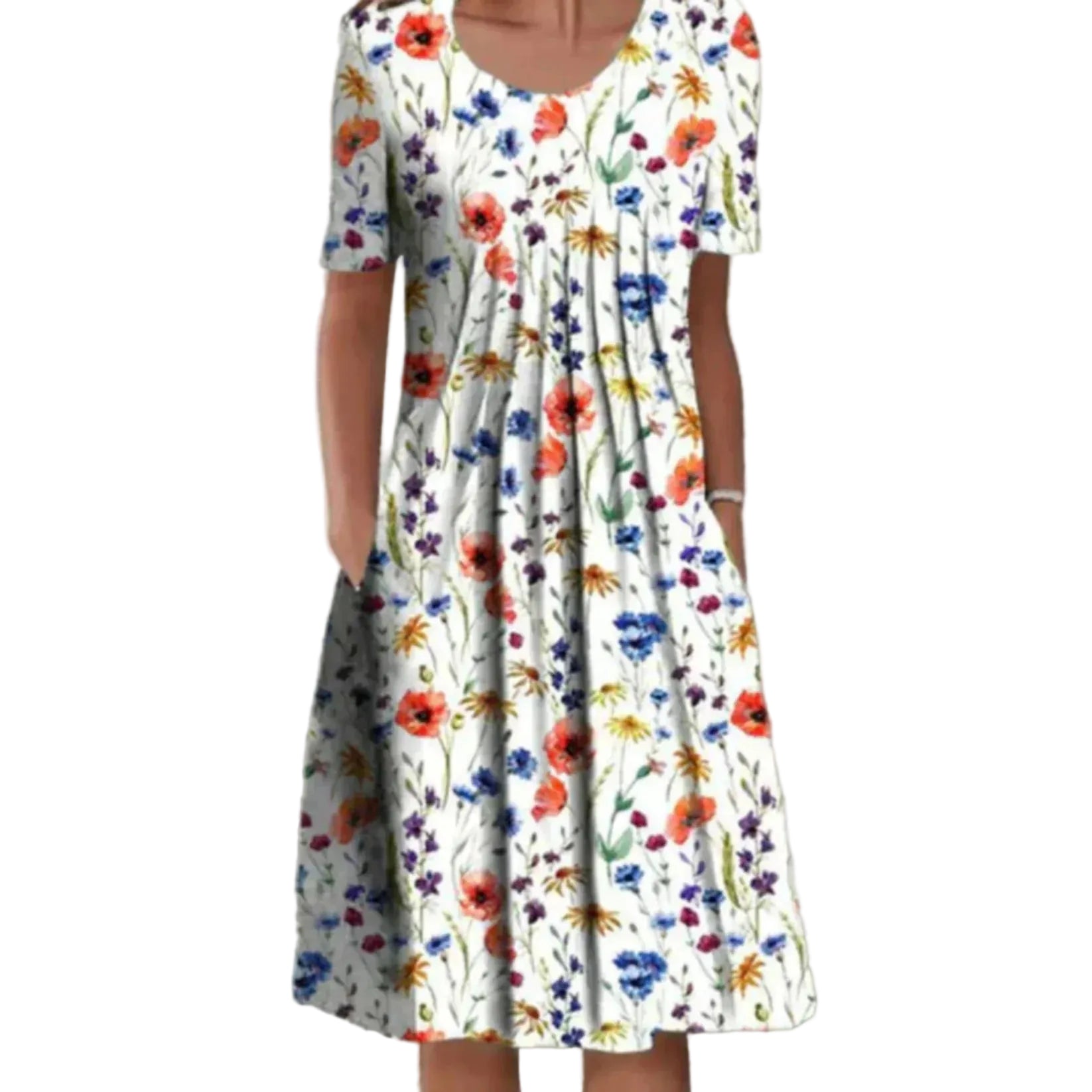 Robe midi femme Charlène légère et élégante, blanche à imprimé fleurs multicolores, manches courtes, encolure arrondie et coupe évasée, portée avec les mains dans les poches.