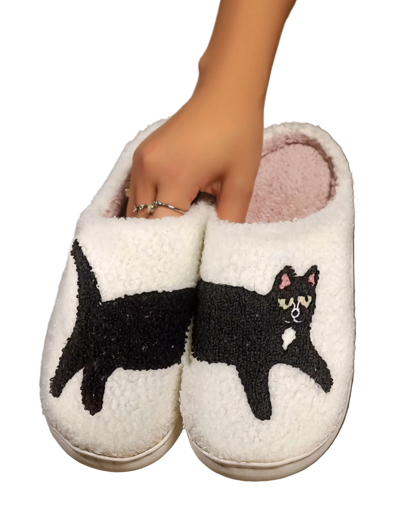 These soft and comfortable slippers feature a charming cat print, perfect for adding a cute touch to your relaxation time. Offering pleasant warmth and a soft texture, these slippers are ideal for keeping you cozy and stylish at home.