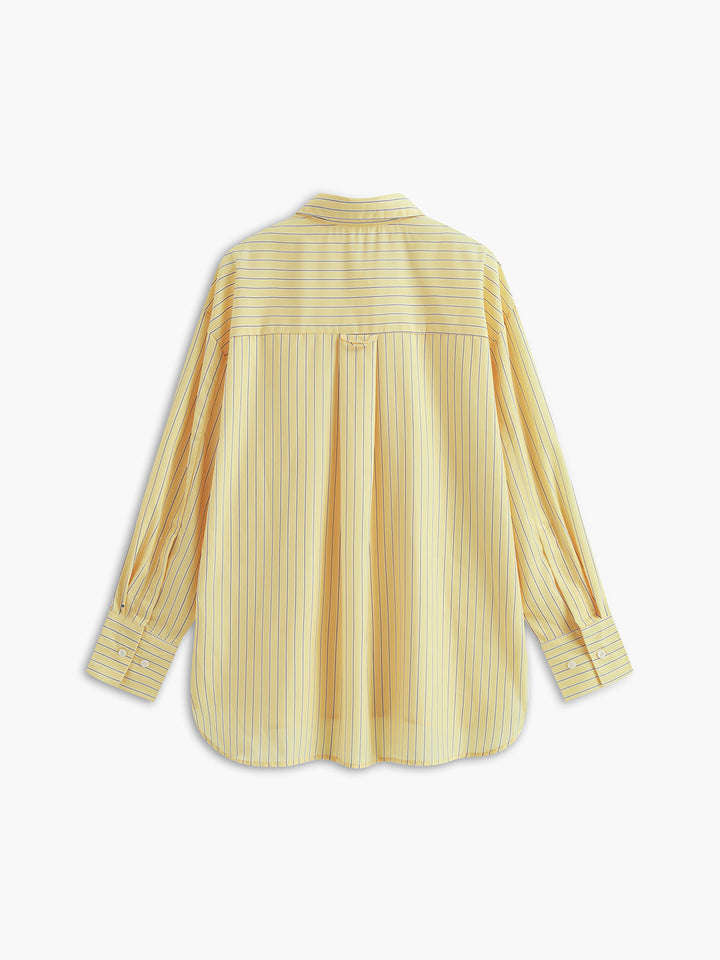 Chemise rayée Ever pour femme vue de dos, jaune à fines rayures verticales, coupe fluide avec manches longues, élégante et polyvalente pour un style chic et léger.