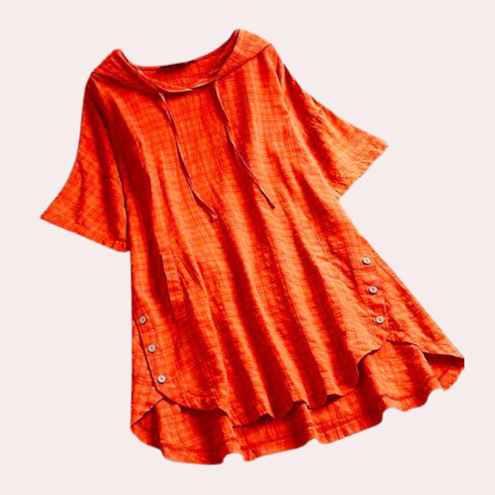 Tunique Frida pour femme, légère et confortable, coupe ample à manches courtes, coloris orange avec détails boutonnés et tissu texturé, idéale pour un look décontracté et tendance.