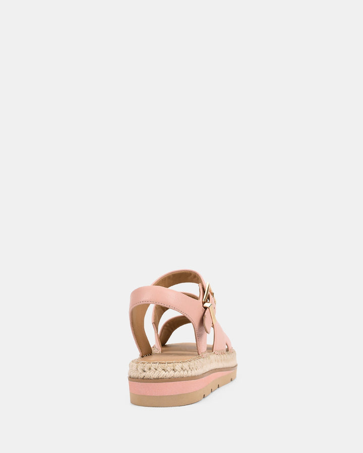 Vue arrière des sandales, avec une fermeture à boucle dorée et une semelle en jute. Leur design élégant et confortable les rend idéales pour les journées estivales, alliant praticité et style.