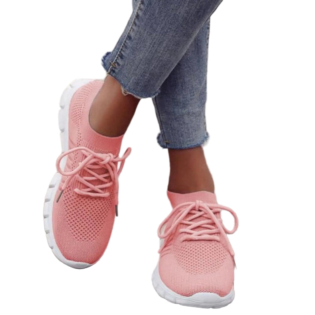 Ces baskets roses pour femmes allient confort et style moderne, parfaites pour une tenue décontractée, avec une semelle antidérapante et un design aéré.