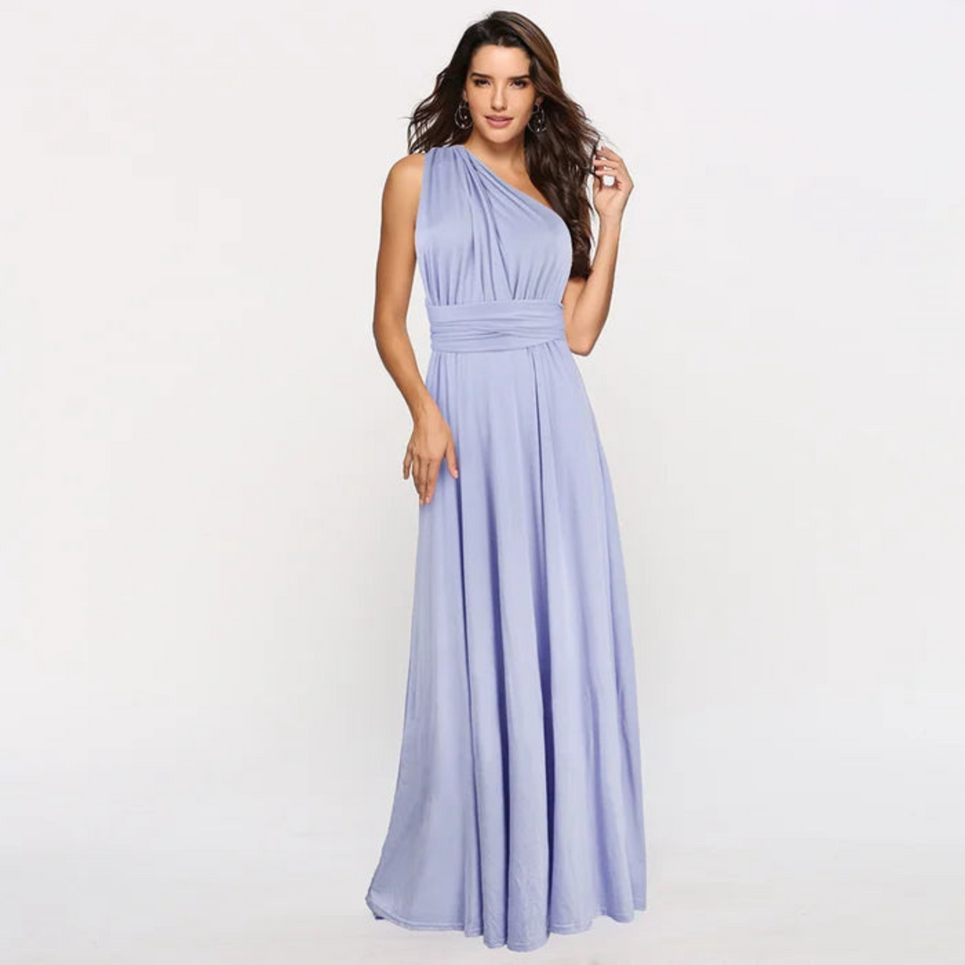 Robe longue lavande, à une épaule, avec une coupe fluide et un tissu doux et léger. Son design élégant et moderne met en valeur la silhouette tout en offrant un confort optimal. Parfaite pour les occasions spéciales, cette robe allie beauté et simplicité dans un style raffiné et féminin.