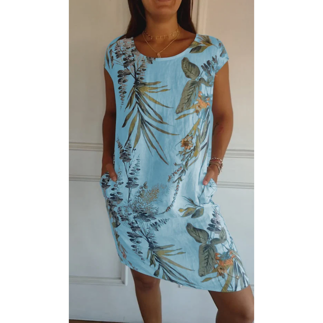 Robe mini en lin Nicolette pour femme, de couleur bleue avec un motif floral élégant. Légère, avec des poches et idéale pour l&