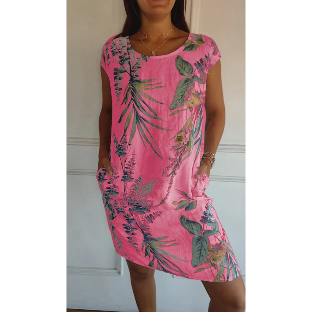 Robe mini en lin Nicolette pour femme, de couleur rose vif avec un motif floral élégant. Légère, avec des poches et parfaite pour l&