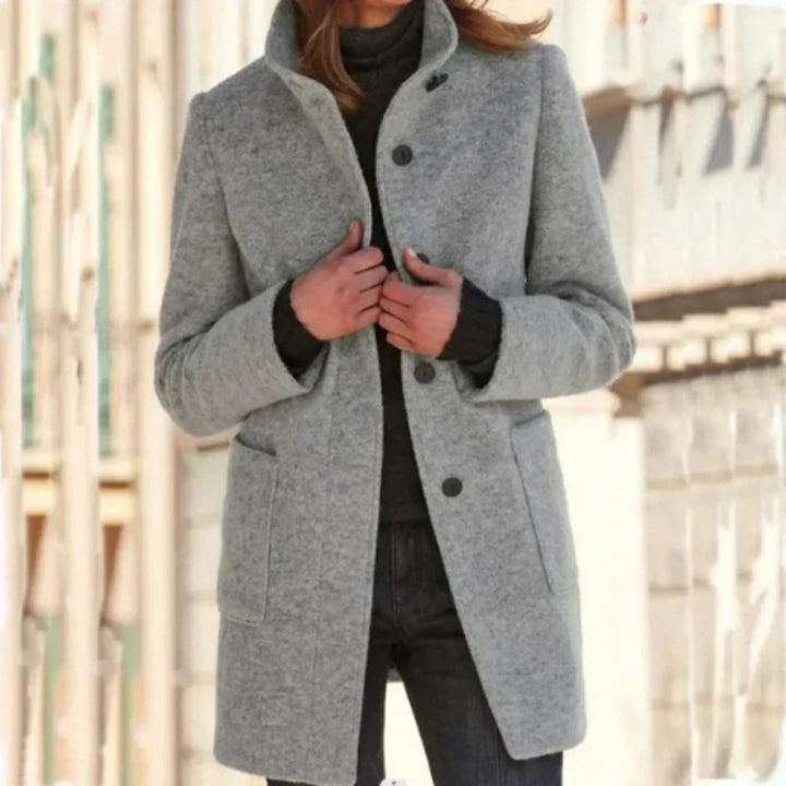 Manteau femme cintré à col droit